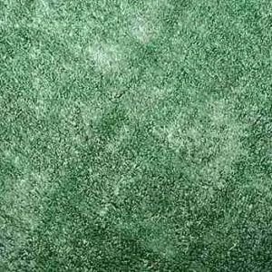 artificial grass carpet with natural look used in a home garden in UAE.