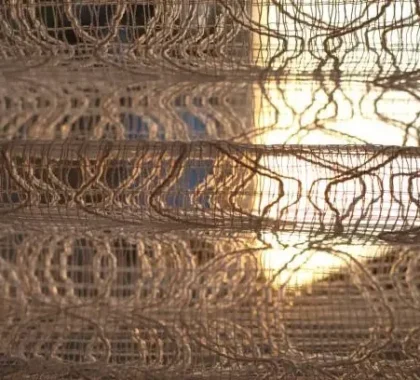 artistic woven curtains with sunlight creating dramatic effect