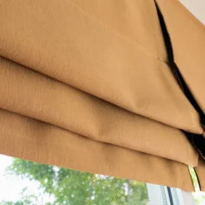 Beige linen roller blinds with natural texture for elegant interiors.