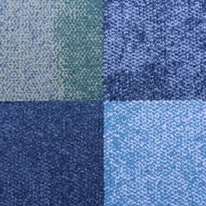 blue carpet tiles installed in a modern Dubai office workspace.