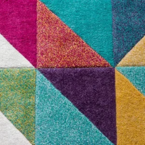 colorful geometric carpet tiles in a creative Dubai office environment.