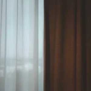 layered linen and blackout curtains combined for light control and privacy