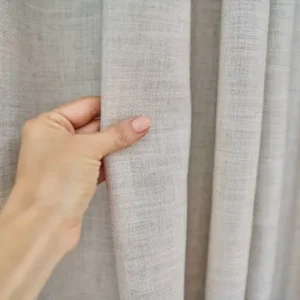 close-up of grey fabric curtain showing detailed texture and material