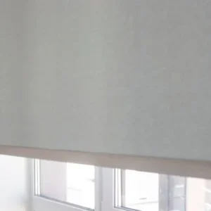 Motorized curtain blinds in a luxury living room setting.