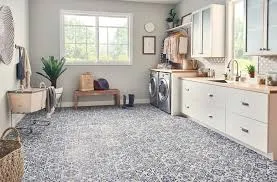 grey vinyl flooring installed in a modern laundry room with water resistant surface.