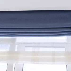 Close-up of linen roller blind texture showing natural fabric detail.
