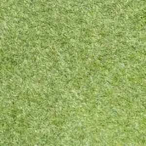 light green artificial grass carpet installed on a residential balcony in UAE.