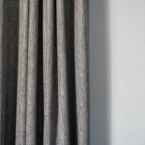 close-up of linen curtain showing natural texture and soft folds