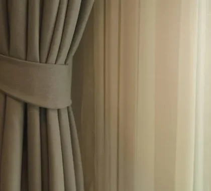 linen curtain tied back neatly for modern window styling