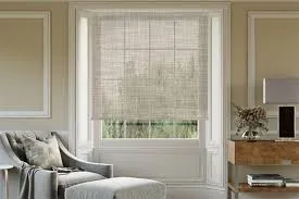 Light-colored sheer linen roller blinds enhancing natural daylight indoors.