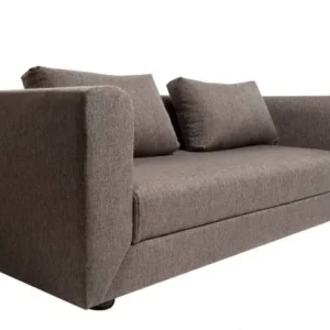 and grey cushions styled on a minimal modern sofa.
