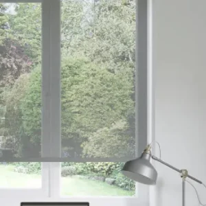 Sunscreen blinds in a modern home allowing filtered sunlight