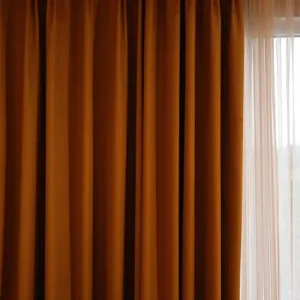 golden blackout motorized curtains fully closed for complete light blocking