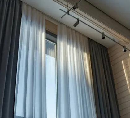 motorized curtains with sheer and blackout layers in modern living room with ceiling track