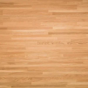 natural light wooden flooring planks in a bright home interior.