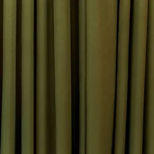 olive tone curtain fabric with soft folds used for light filtering window styling