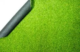 rolled artificial grass carpet prepared for installation in Dubai outdoor space.