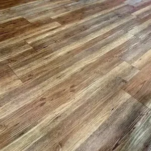 rustic wood style vinyl flooring used in a UAE living room interio.
