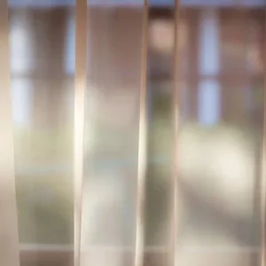 vertical sheer curtains diffusing soft natural light in contemporary room