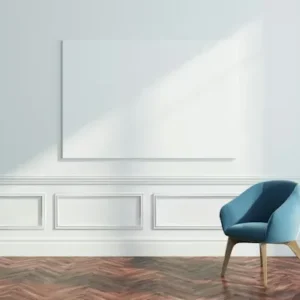 white decorative wall panels in a bright modern living room with blue chair.